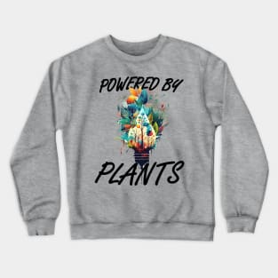 Light up your wardrobe with our 'Powered by Plants' tee! Featuring a vibrant illustration of plants and a powerful message for the vegan community Crewneck Sweatshirt